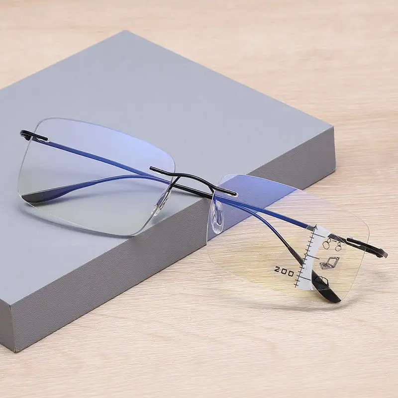 Factory Gafas de lectura unisex multifocal transition auto focus blue light filter ultra thin frameless reading glasses